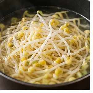 Seasoning the soybean sprout soup with Korean soup soy sauce